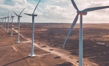 Windmills in a desert.