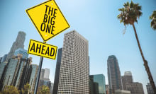 Downtown Los Angeles with earthquake warning signs