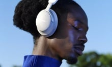 person wearing bose quietcomfort ultra headphones