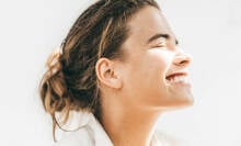 Girl smiling with visibly white teeth