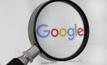 Google logo behind magnifying glass