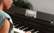 young woman learning piano