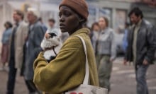 Sam (Lupita Nyong'o) and Frodo the cat cling together in "A Quiet Place: Day One."