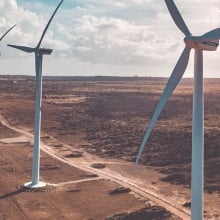 Windmills in a desert.