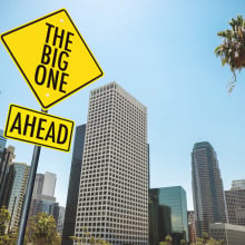 Downtown Los Angeles with earthquake warning signs