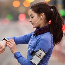 woman using smart watch