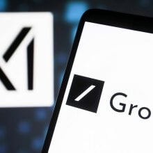 A smartphone displays the word "Grok", while the X logo is visible in the background.