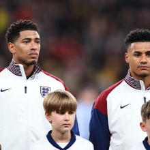 Jude Bellingham and Ollie Watkins of England line up