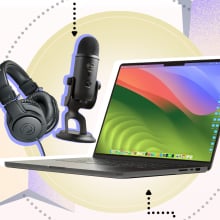 A laptop, microphone, and headphones on a colorful graphic background.