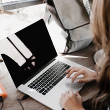 Women searching on laptop