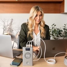 Women charging her devices