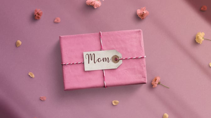 Pink gift top view. mothers day text on banner - stock photo