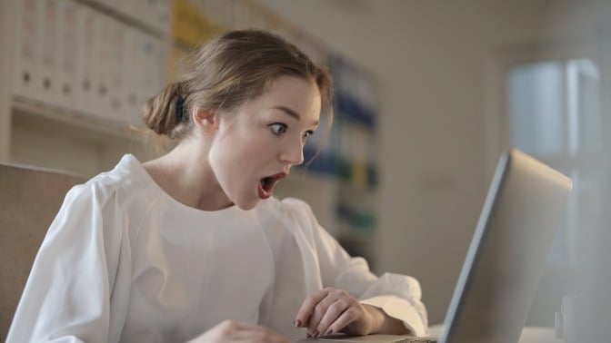 Girl staring at laptop