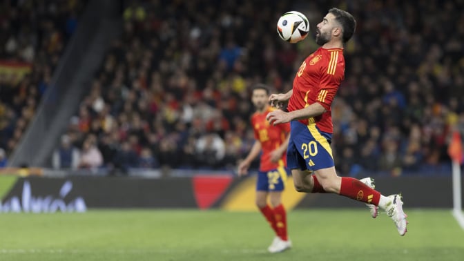 Daniel Carvajal of Spain is controlling the ball