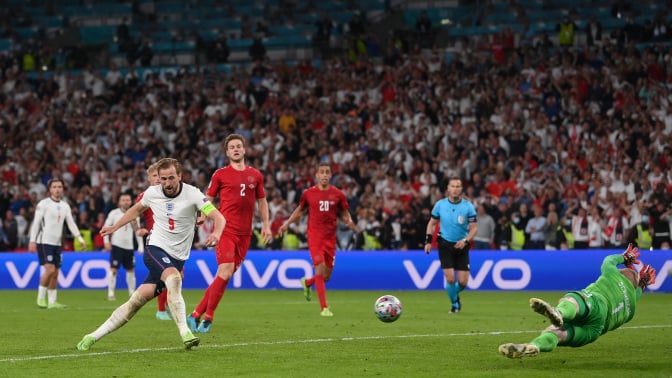 Harry Kane of England scores