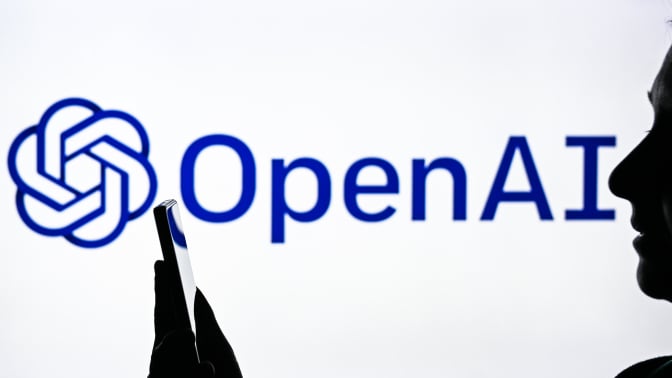 A face in profile in front of the OpenAI logo.