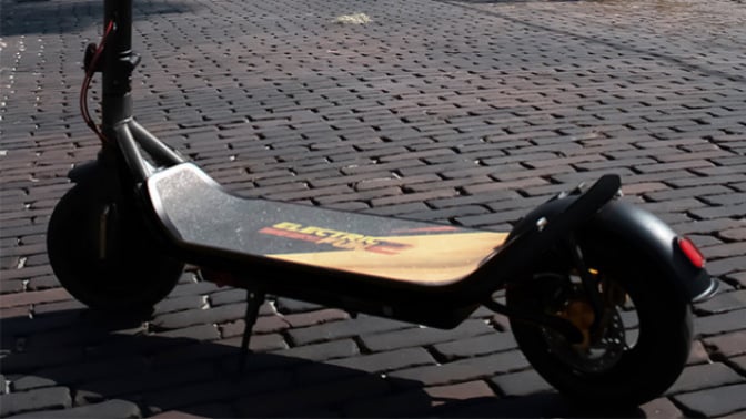 close-up of electric2fun folding scooter on cobblestones