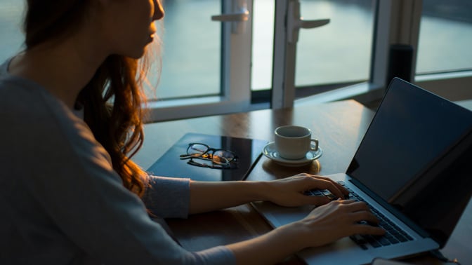 A women working on a laptop