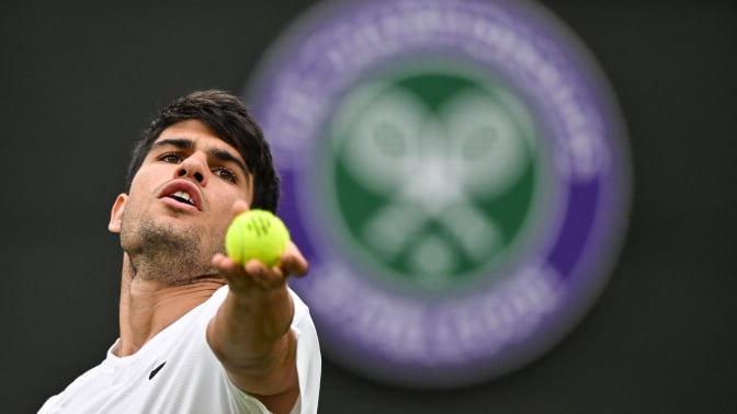 Alcaraz serves at Wimbledon