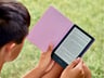 boy reading Kindle kids paperwhite e-reader outside