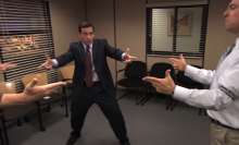 Three men (Rainn Wilson as Dwight, Steve Carell as Michael, and Ed Helms as Andy on "The Office") pointing finger guns at each other