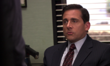 A man (Steve Carell as Michael Scott on "The Office") singing at his desk.