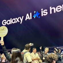 The Samsung Galaxy AI product experience surrounded by excited people.