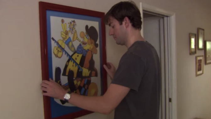 Jim tries to move the clown painting, to no avail.