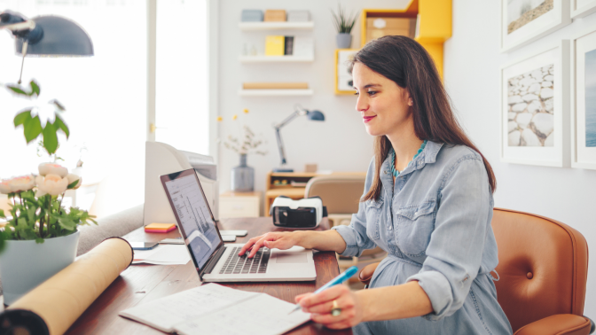 woman working on laptop at home