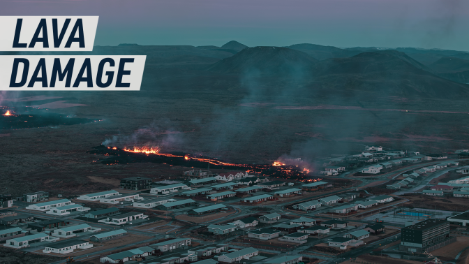 An aerial drone photograph shows the Icelandic town of Grindavík during the volcano eruption on Sunday, 14 January 2024. In the backround, we see new eruptions from the fresh fissures in an immediate proximity to the town. 